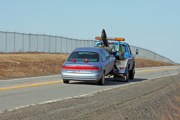 Tow-truck towing car