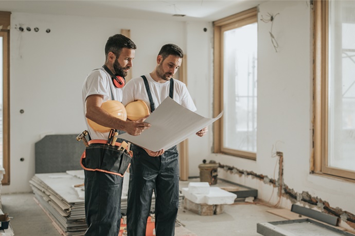 Contractor's examining construction defects.