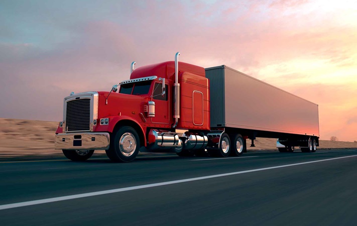 Tractor trailor truck driving on highway