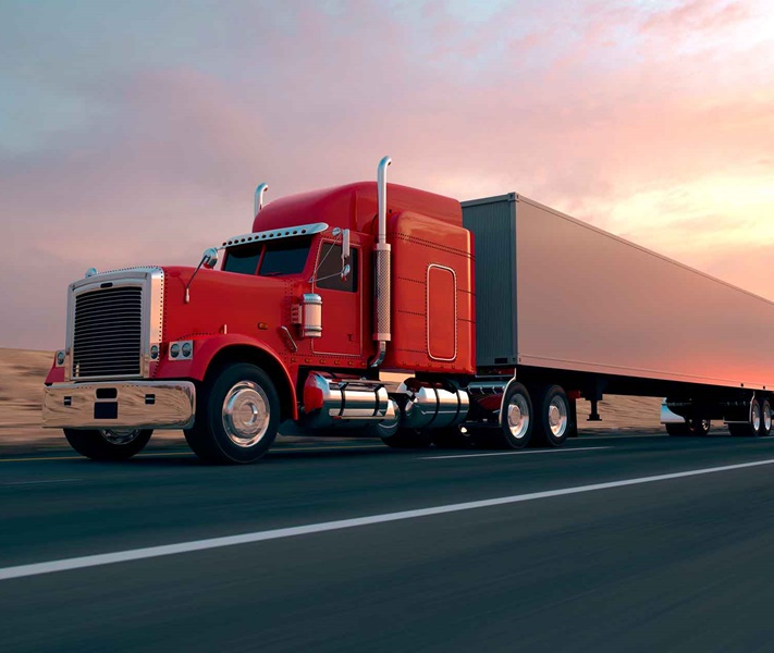 Tractor trailor truck driving on highway