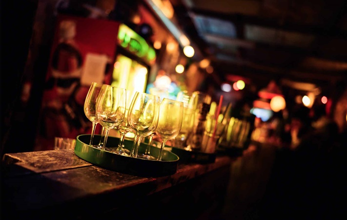 wine glasses on bar
